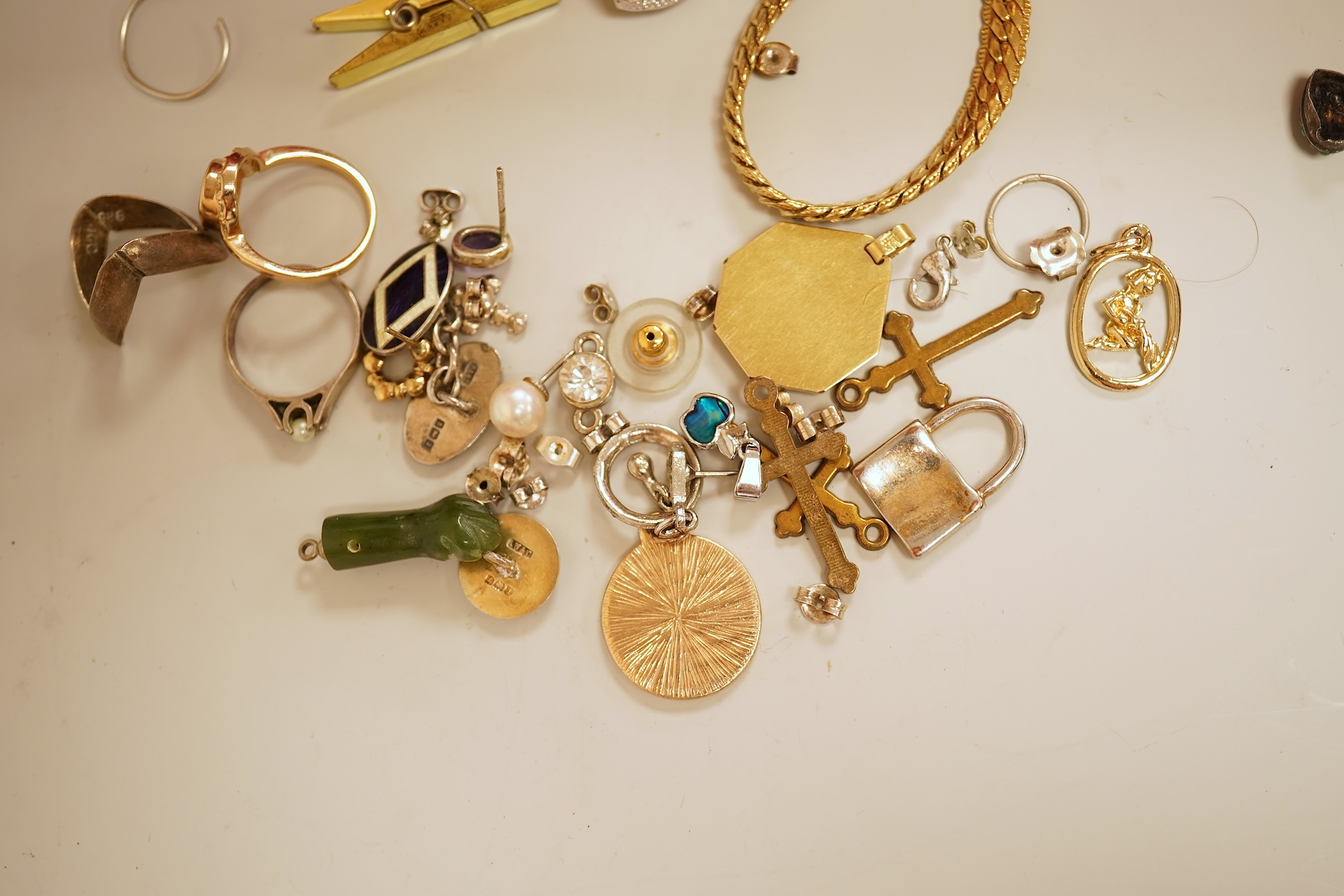 A small collection of assorted costume jewellery and other items including a cut steel shoe buckle, bracelets, chains, pair of silver and enamel oval cufflinks, etc.